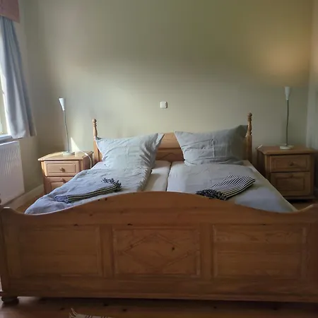 Lejlighed Erdgeschoss, Ueberdachte Terrasse, Familienbett, Holzfussboden *